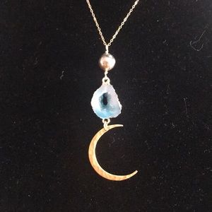 Tahitian pearl necklace with a moon pendant